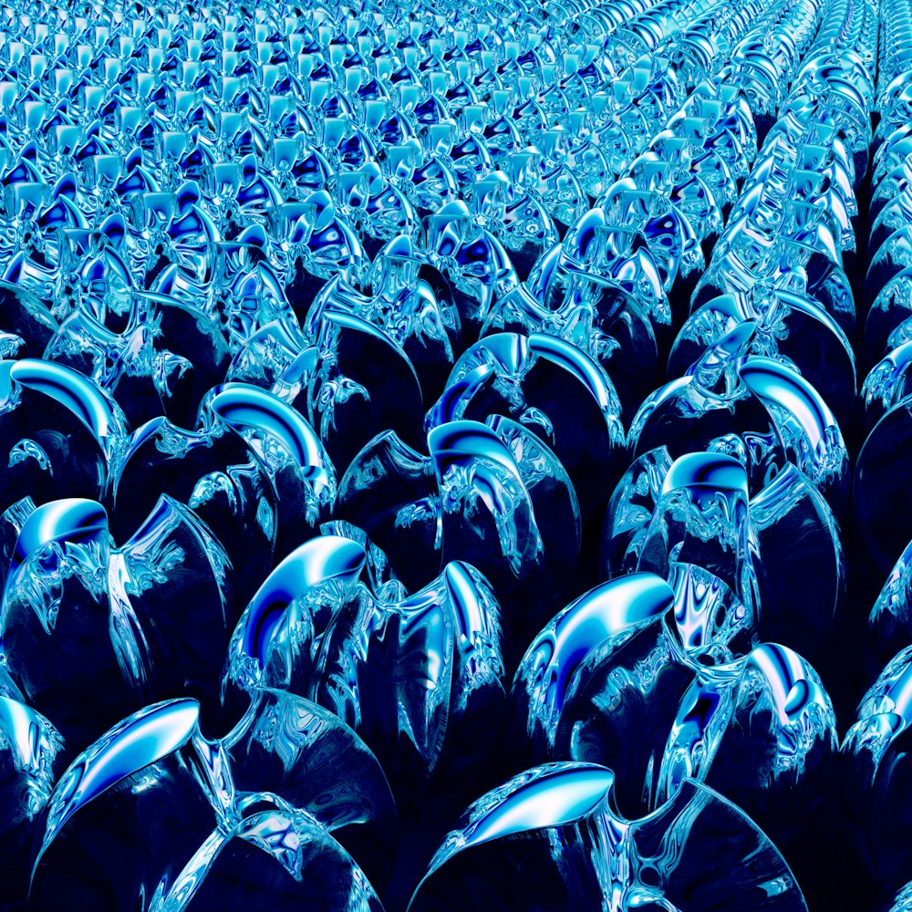 a large group of shiny blue objects in a room