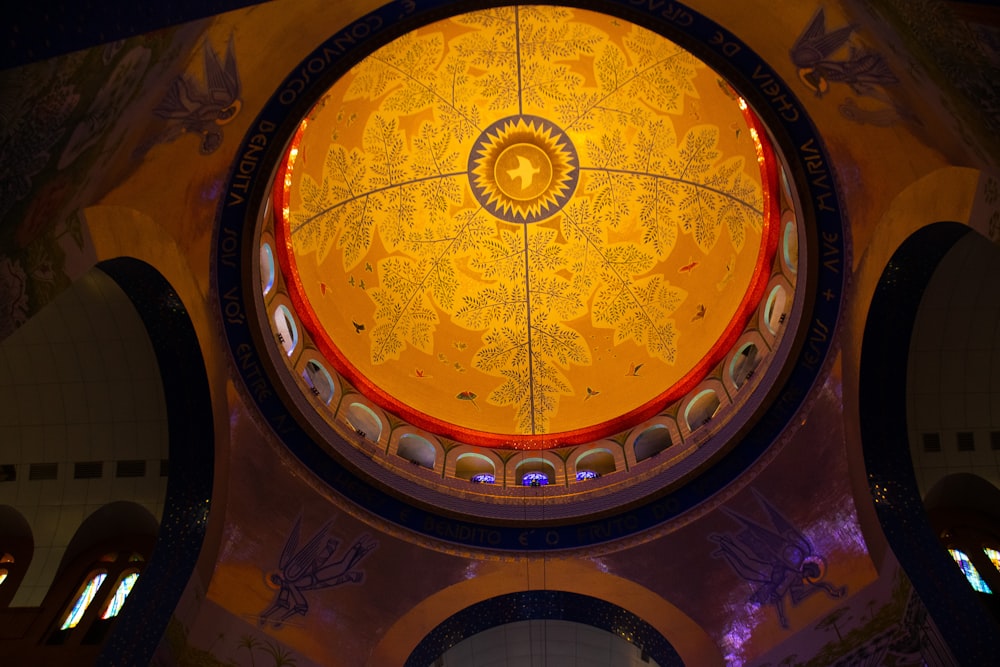 the ceiling of a church with a circular design