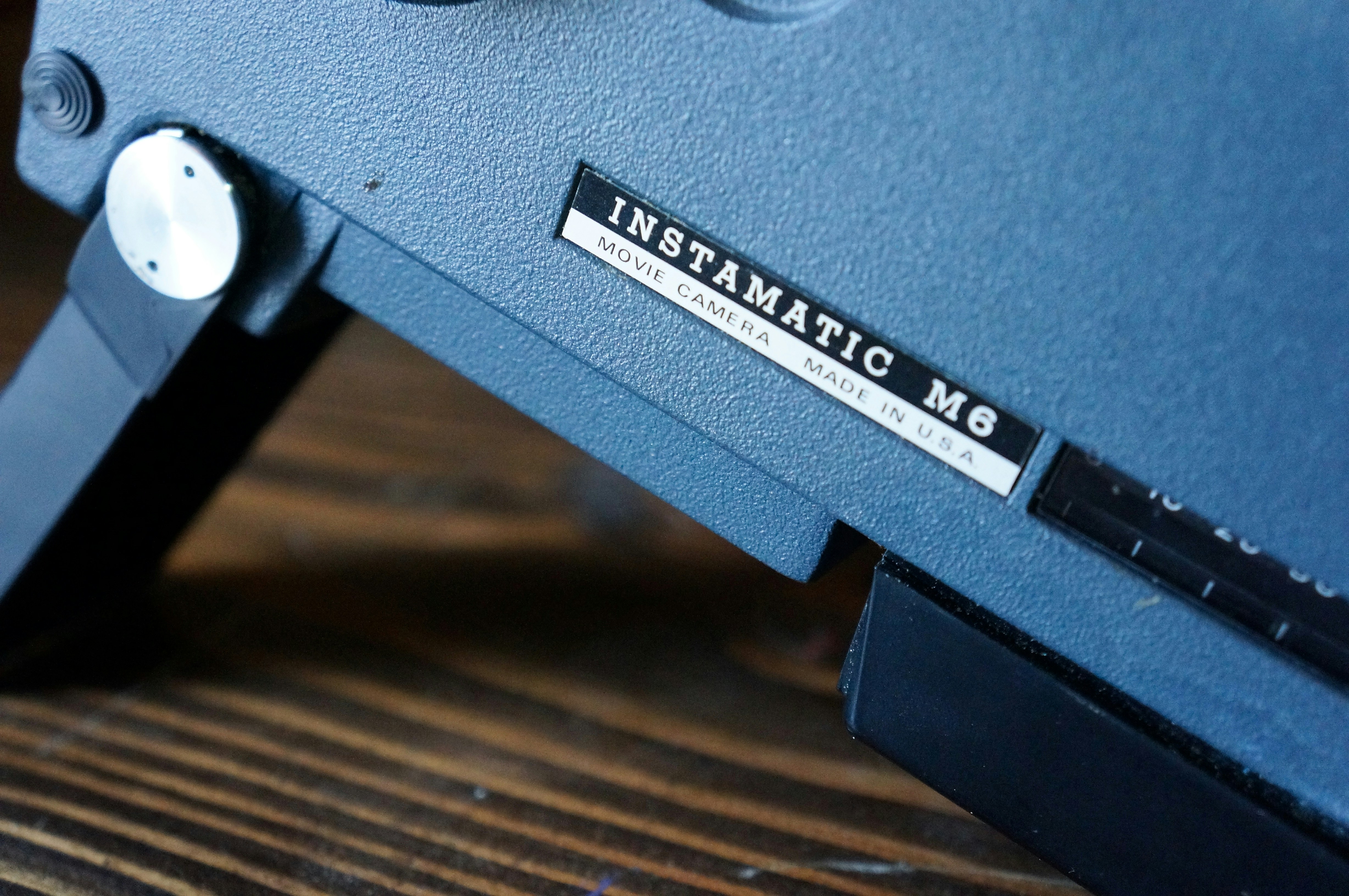 a close up of a computer monitor on a wooden table