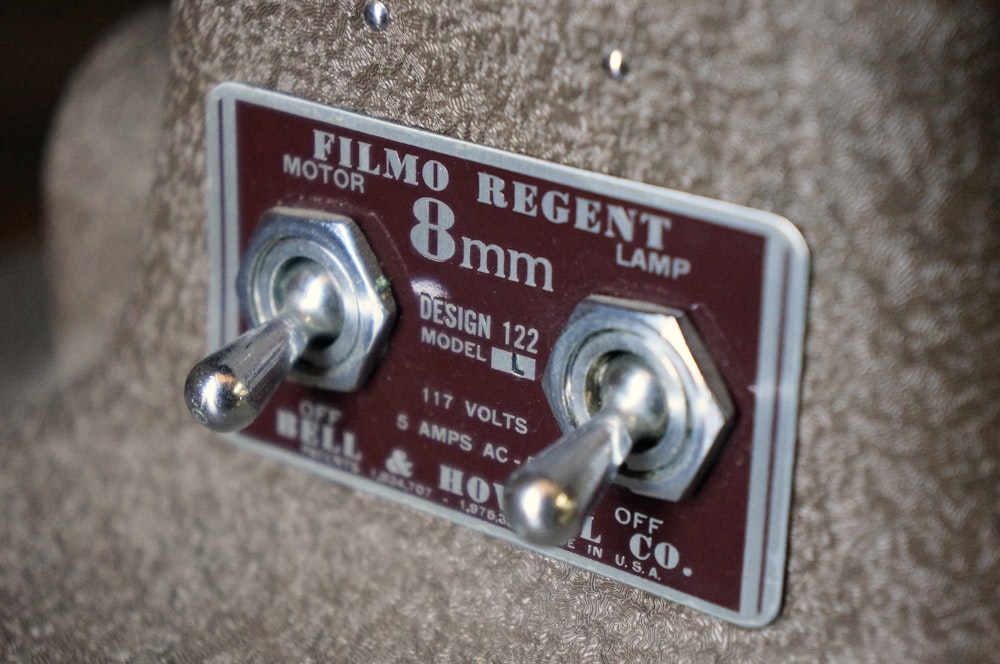 a close up of a button on a hat