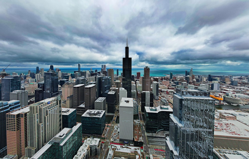 an aerial view of a city with tall buildings