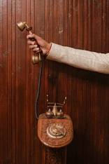 a person is holding a phone in their hand