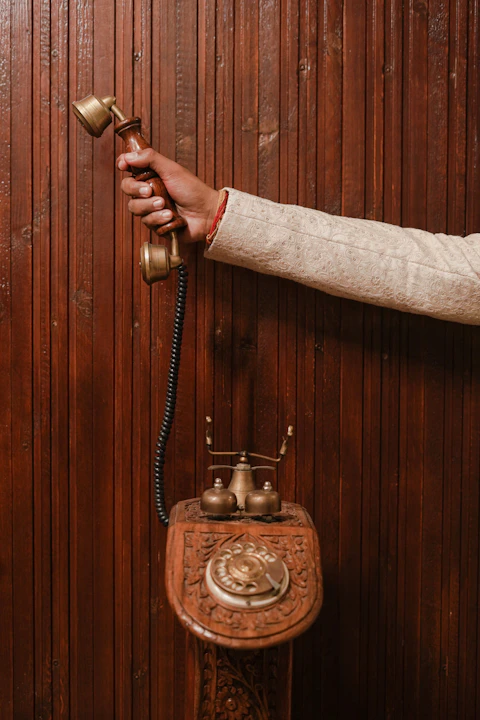 a person is holding a phone in their hand