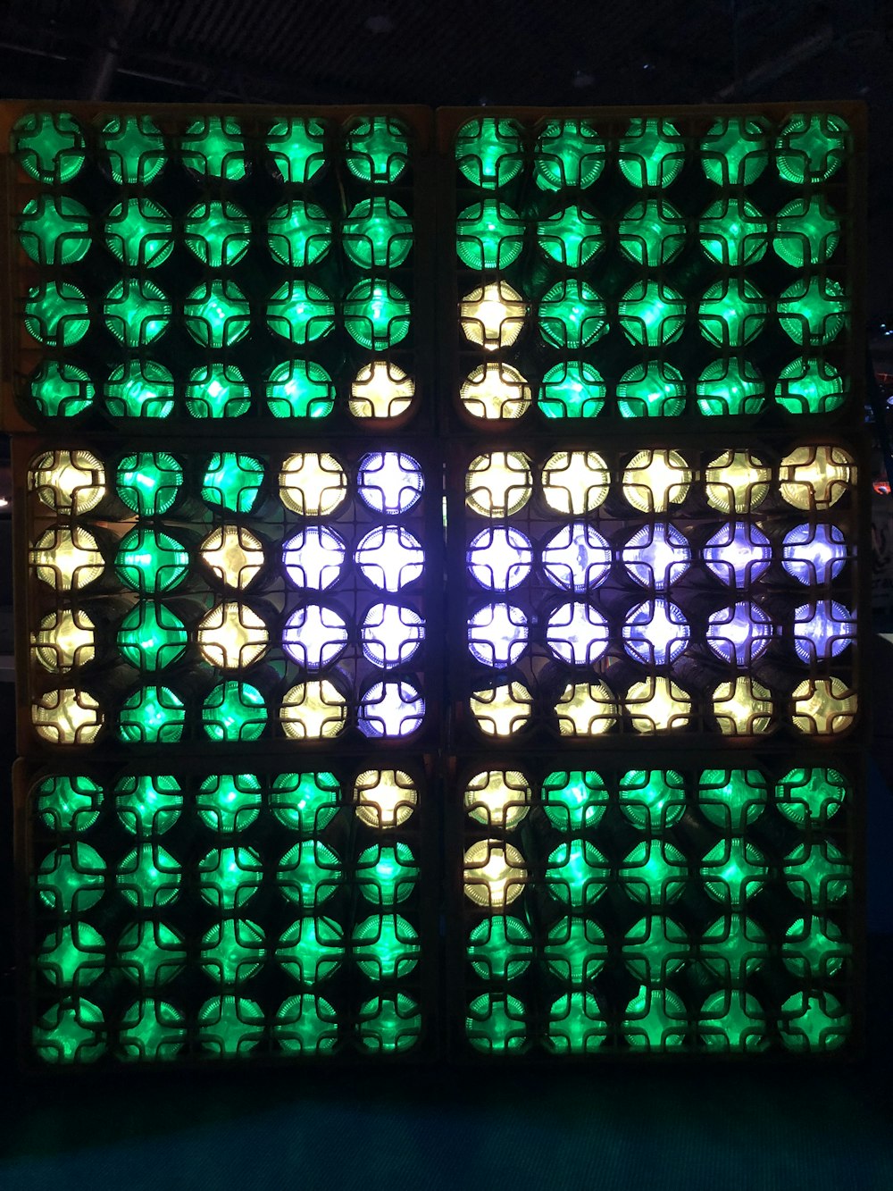 a wall made out of many different colored lights