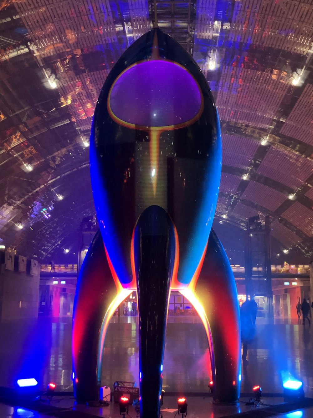 a large colorful object in a large building