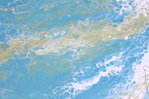 a painting of a blue and yellow ocean