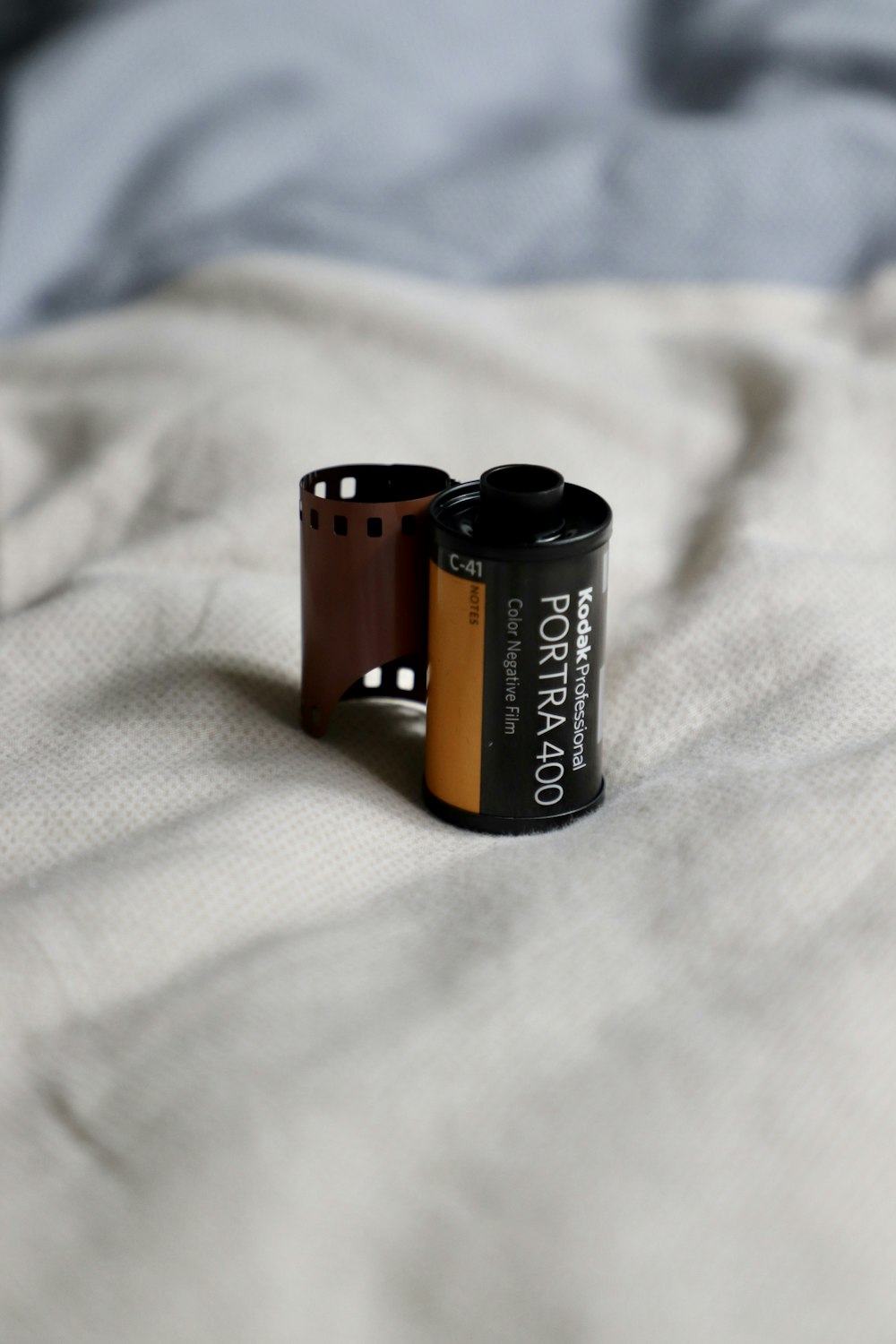 a couple of batteries sitting on top of a bed