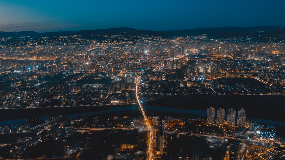 an aerial view of a city at night