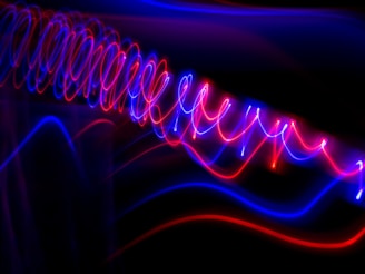 a blurry image of colorful lights in the dark