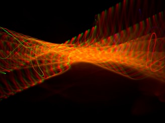 a blurry image of an orange and red object