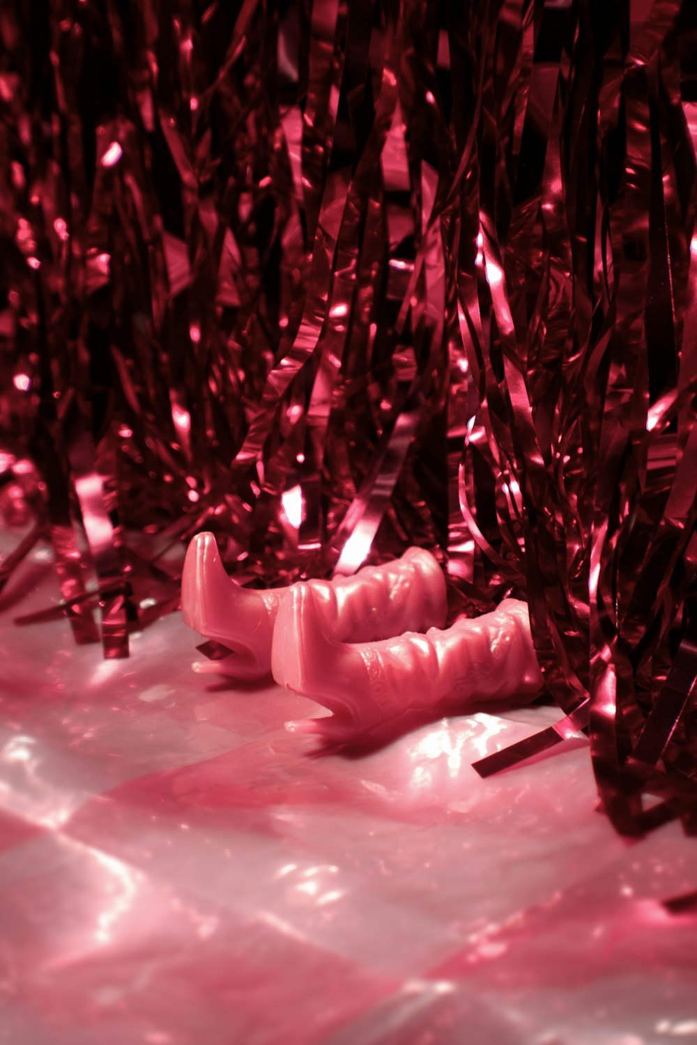 a close up of a pink object on a table