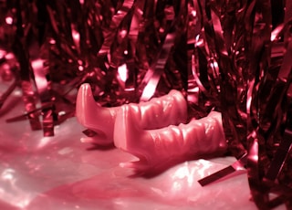 a close up of a pink object on a table