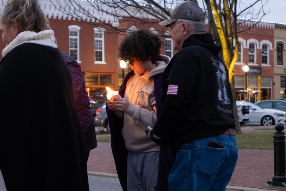 a group of people standing next to each other