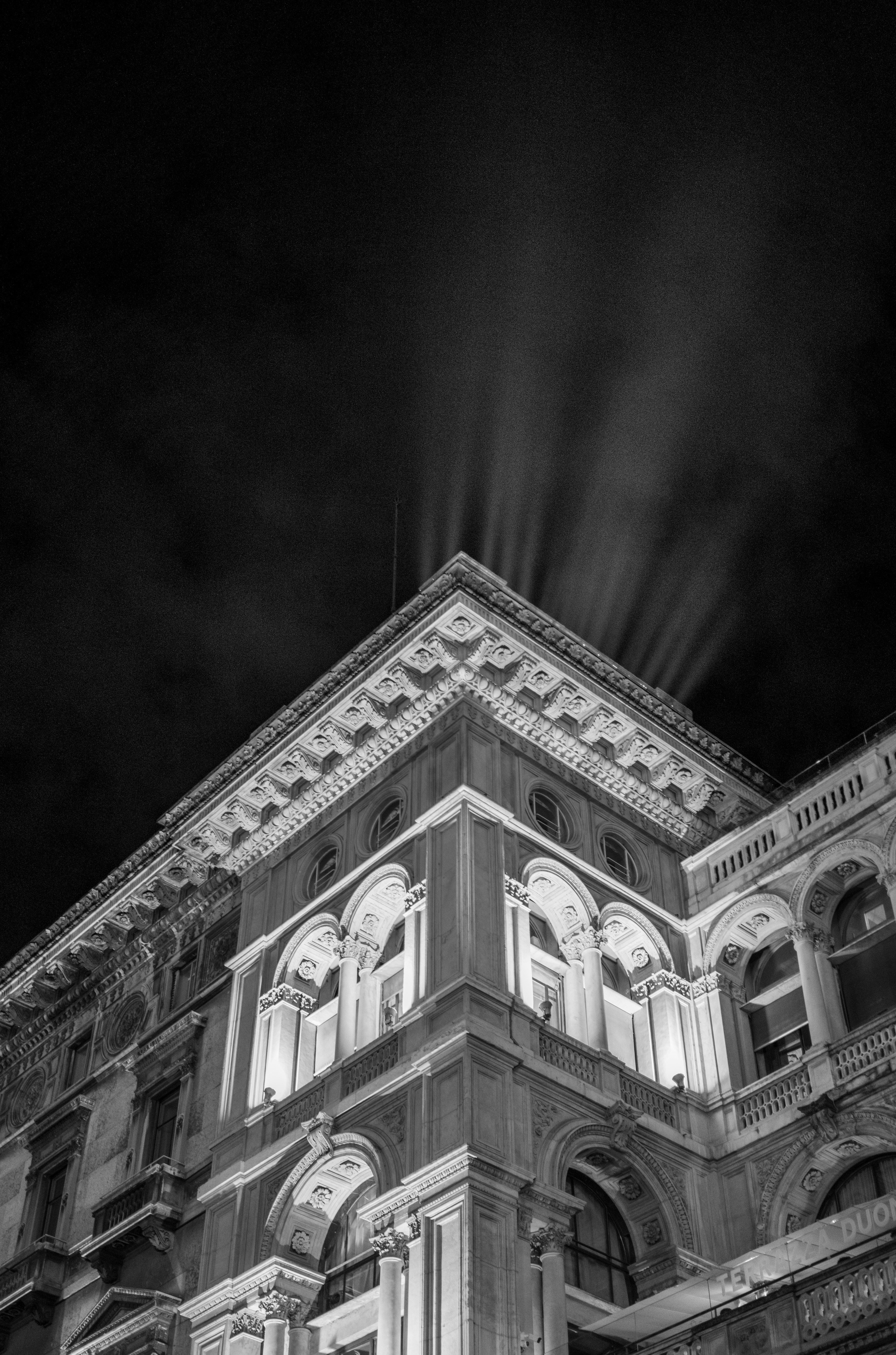 a tall building with a light on top of it