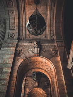 A close-up of intricate chandeliers in a historic Egyptian building.