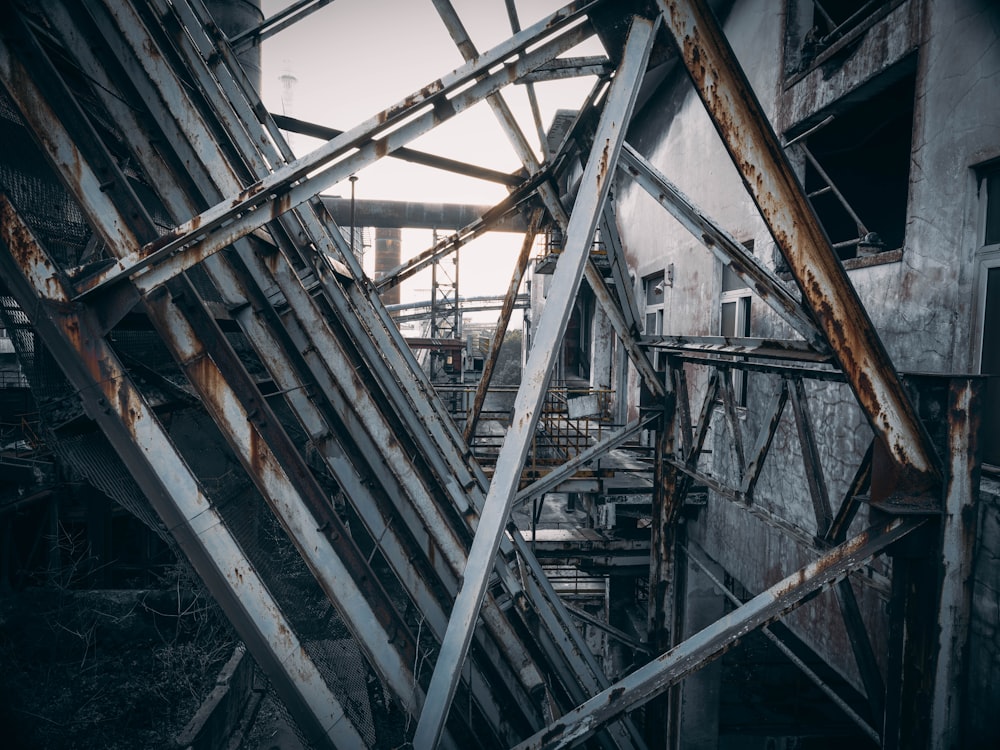 a metal structure with rusted metal bars on it