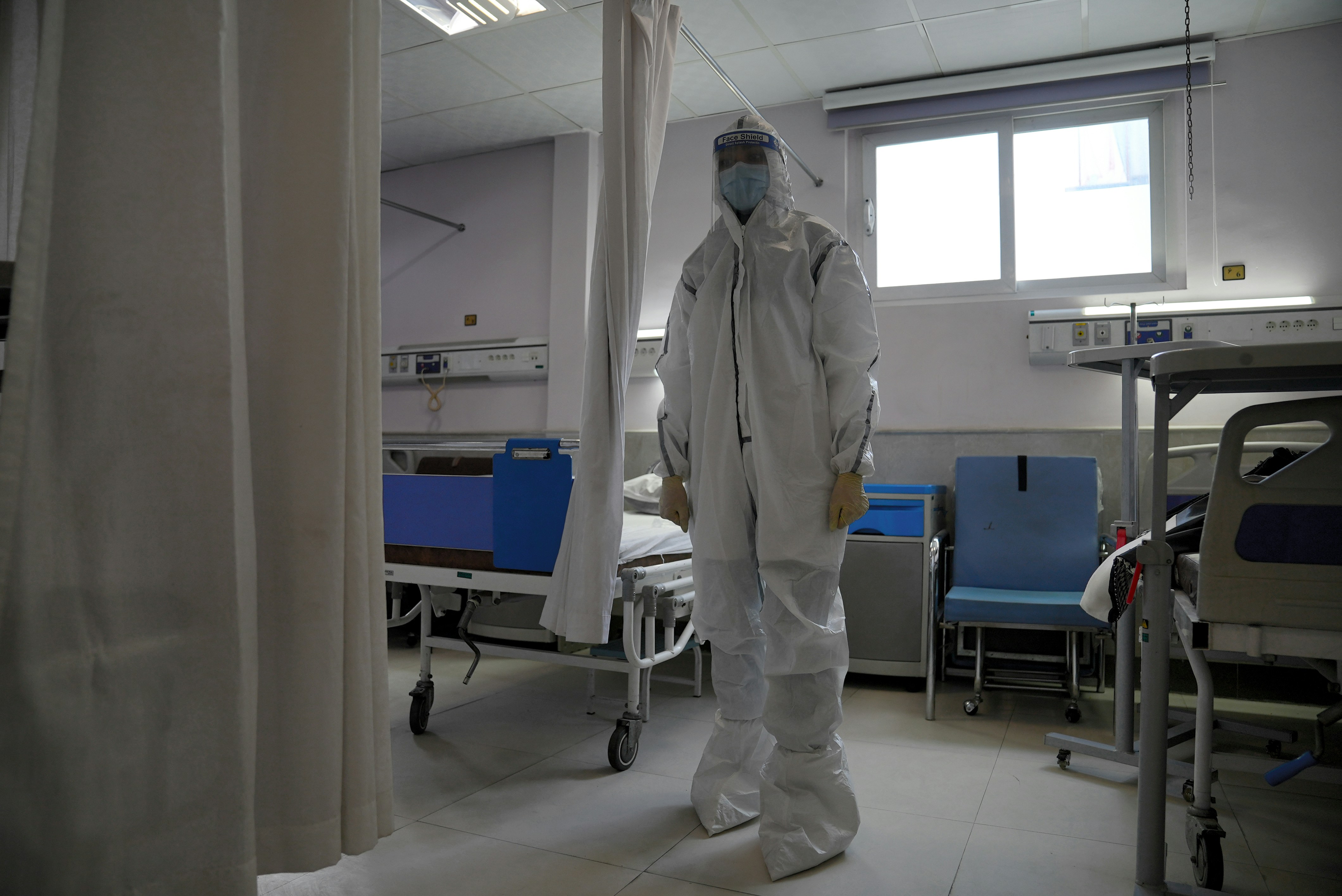 cleaning professional disinfecting exam room - medical office cleaning company