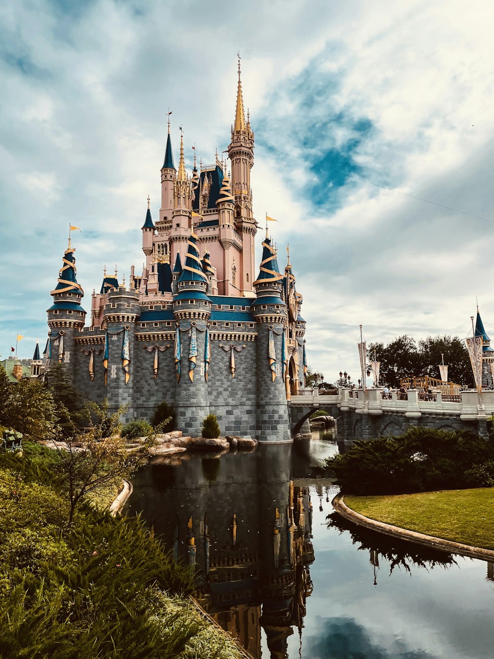 a castle with a bridge in front of it