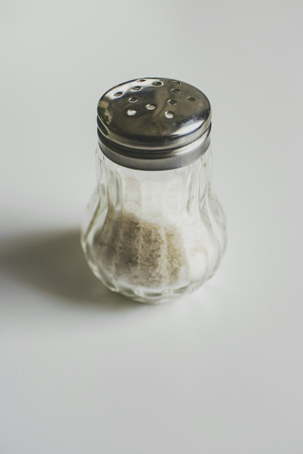 a salt and pepper shaker sitting on a table