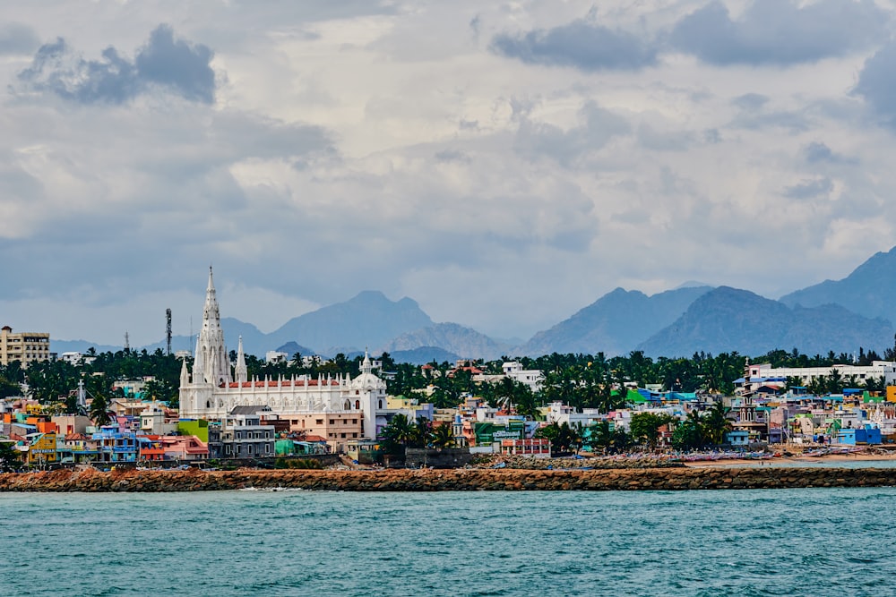 a view of a city with mountains in the background