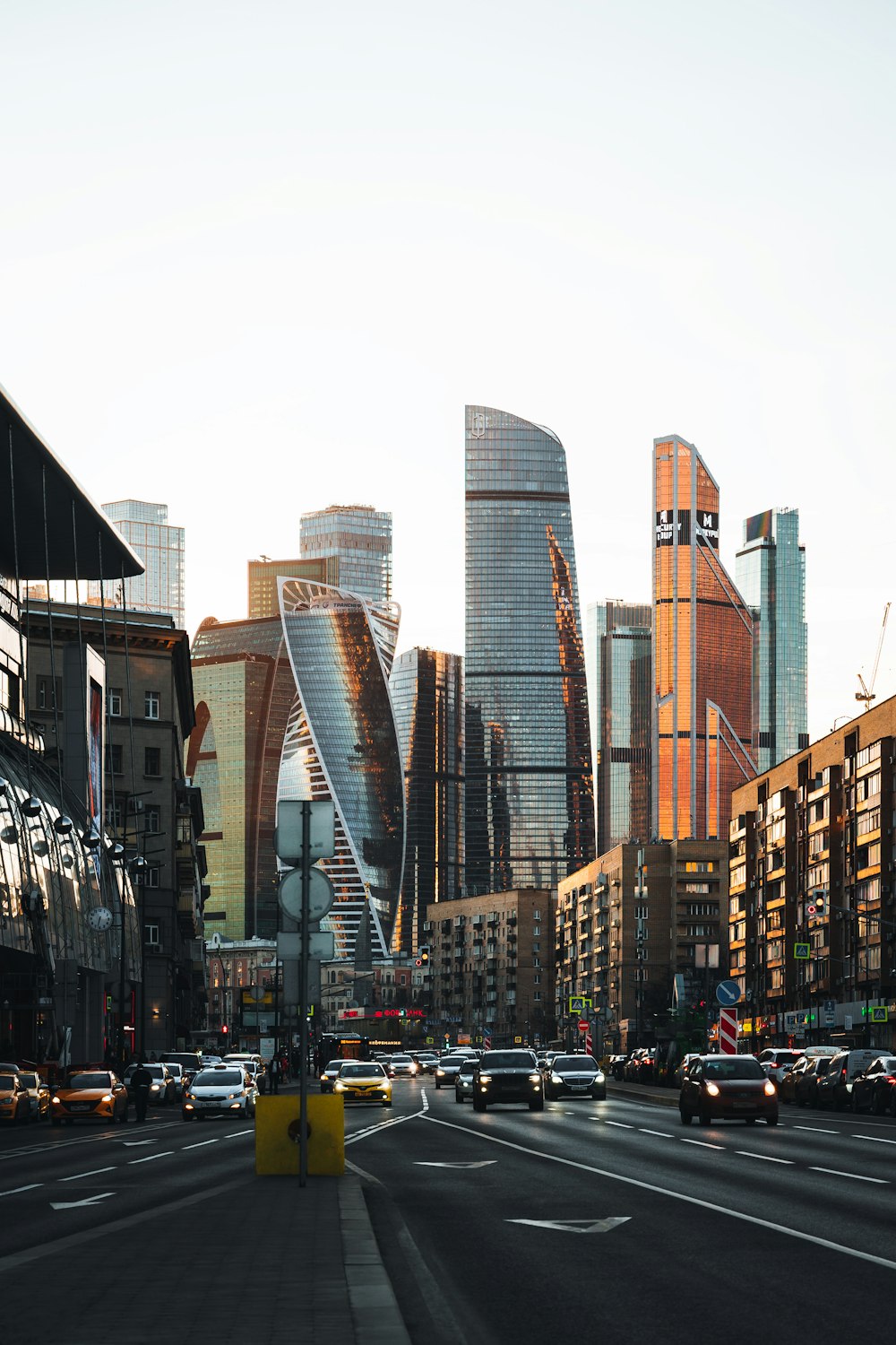 a city street filled with lots of tall buildings