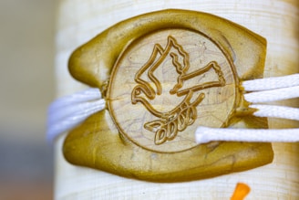 a close up of a carved wooden object