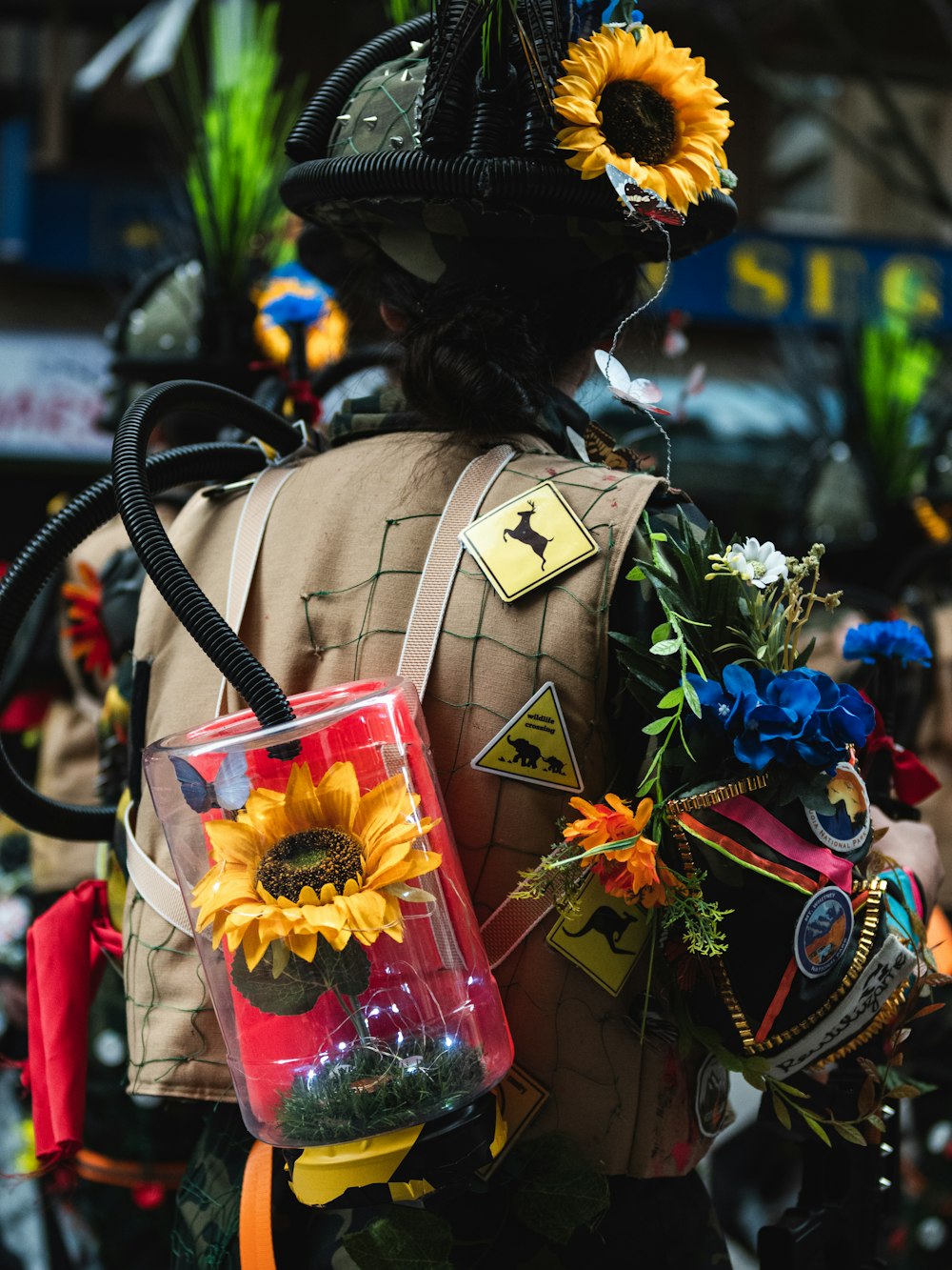 a person wearing a costume with sunflowers on it