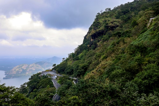 a winding road on the side of a mountain