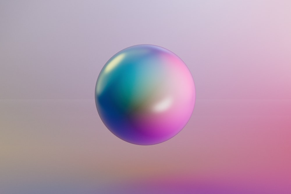a blurry image of a blue and pink ball
