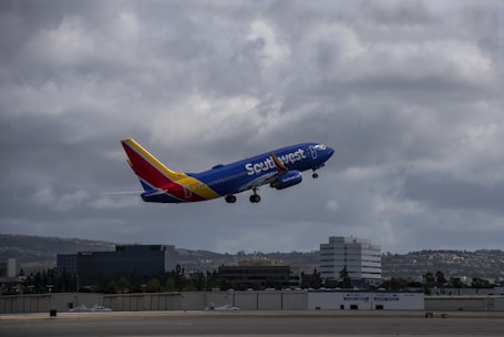 a southwest airlines plane taking off from an airport