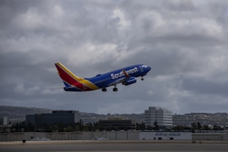 a southwest airlines plane taking off from an airport
