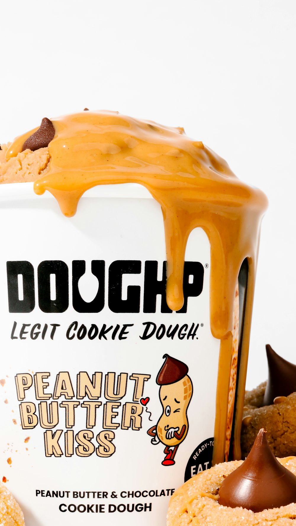 a peanut butter cookie dough is drizzled with caramel