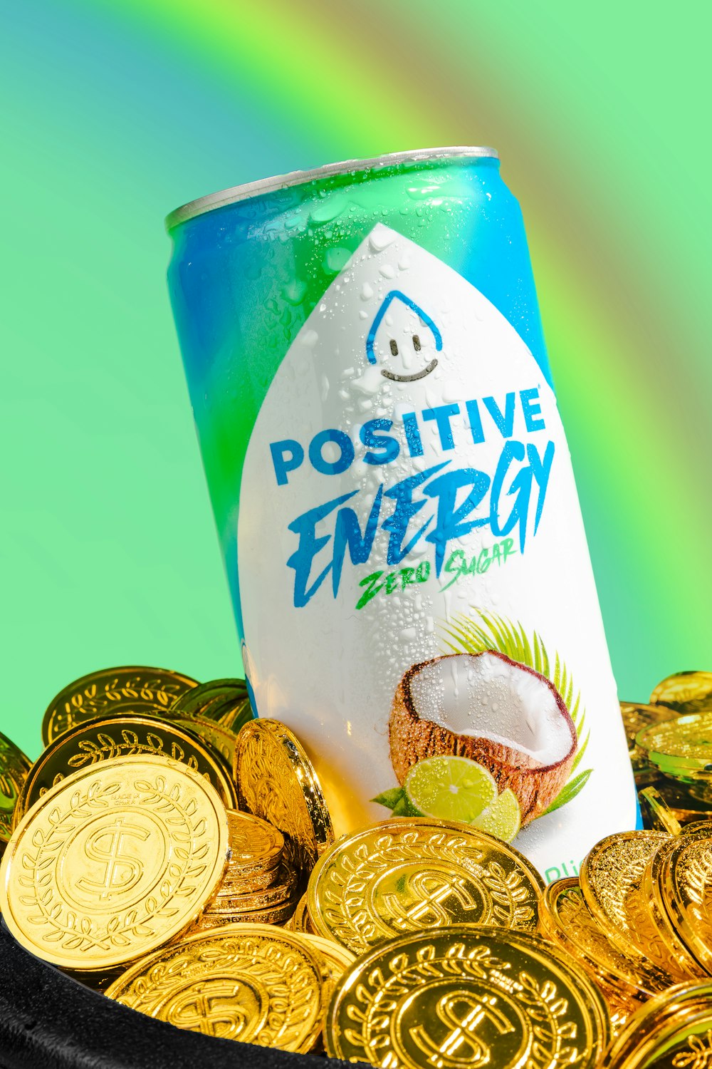 a can of energy drink surrounded by gold coins