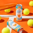 Athlete drinking energy drink after workout