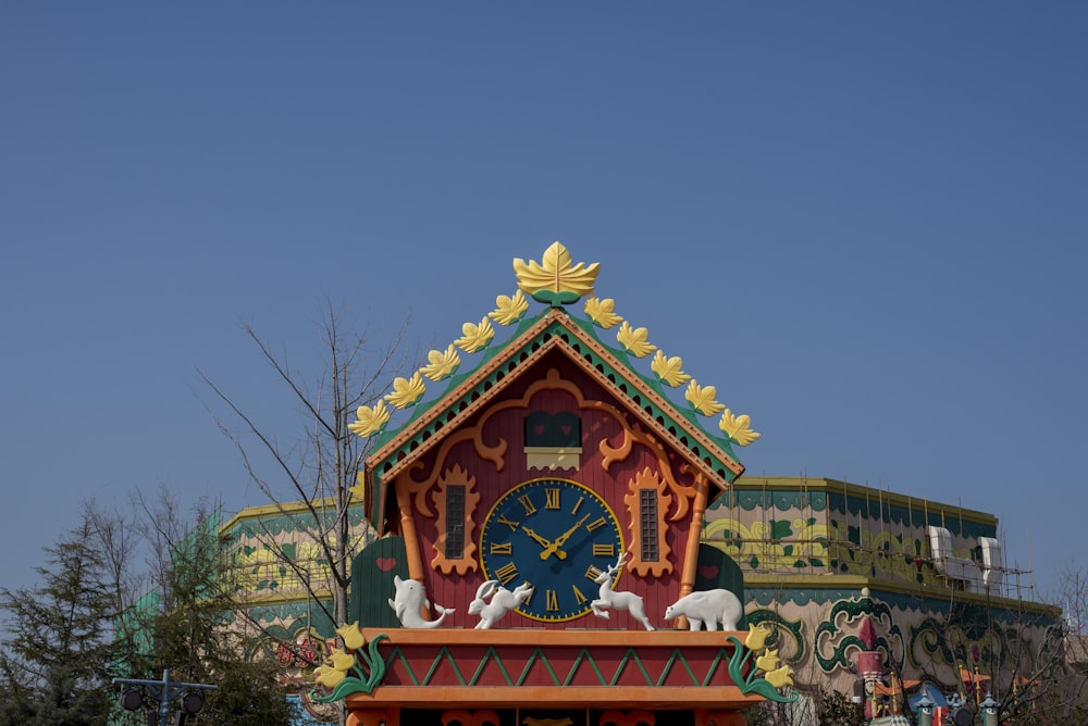 a clock on top of a building with a sky background