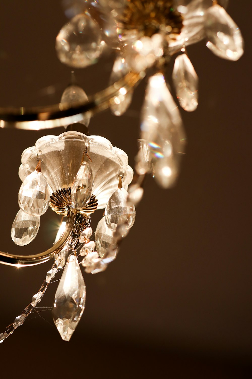 a chandelier hanging from a ceiling in a room