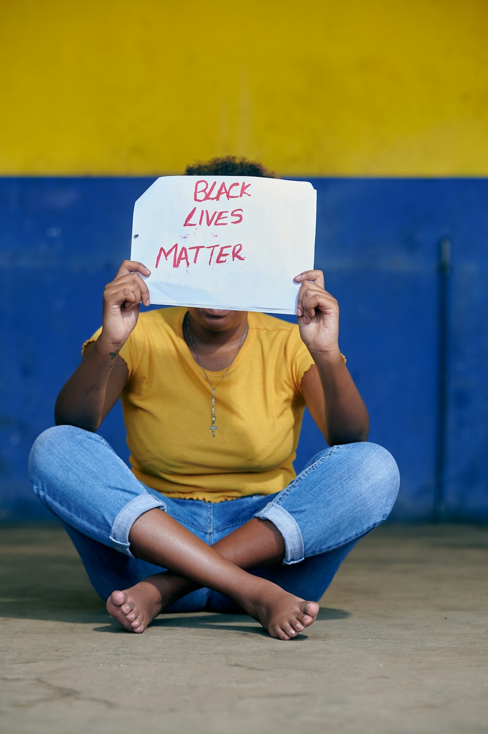 a person holding a sign