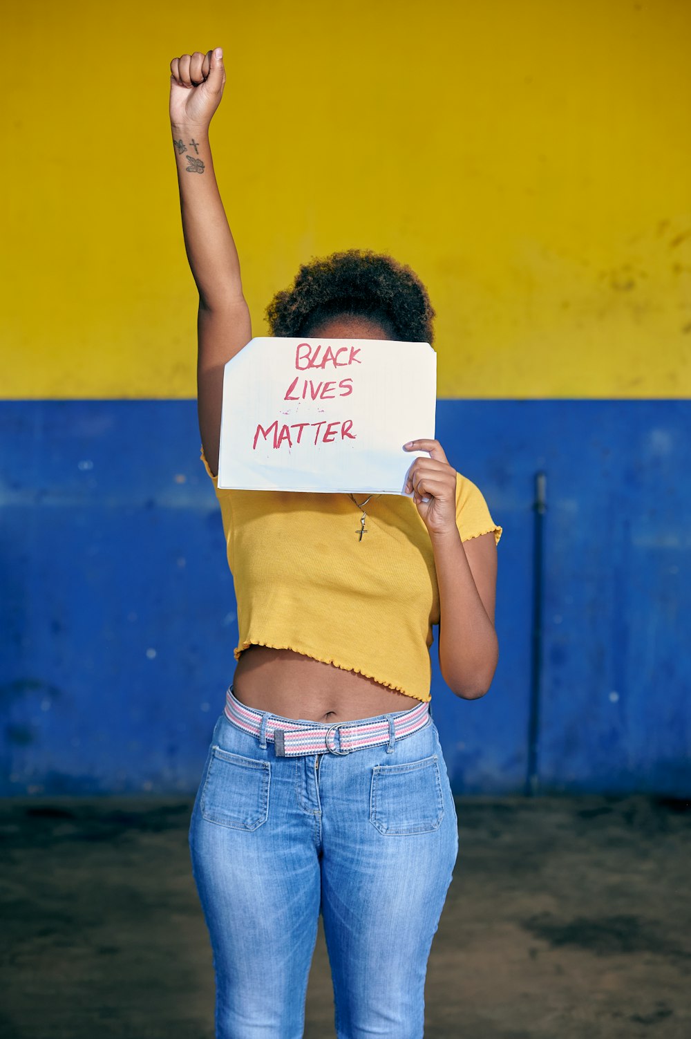 a person holding a sign