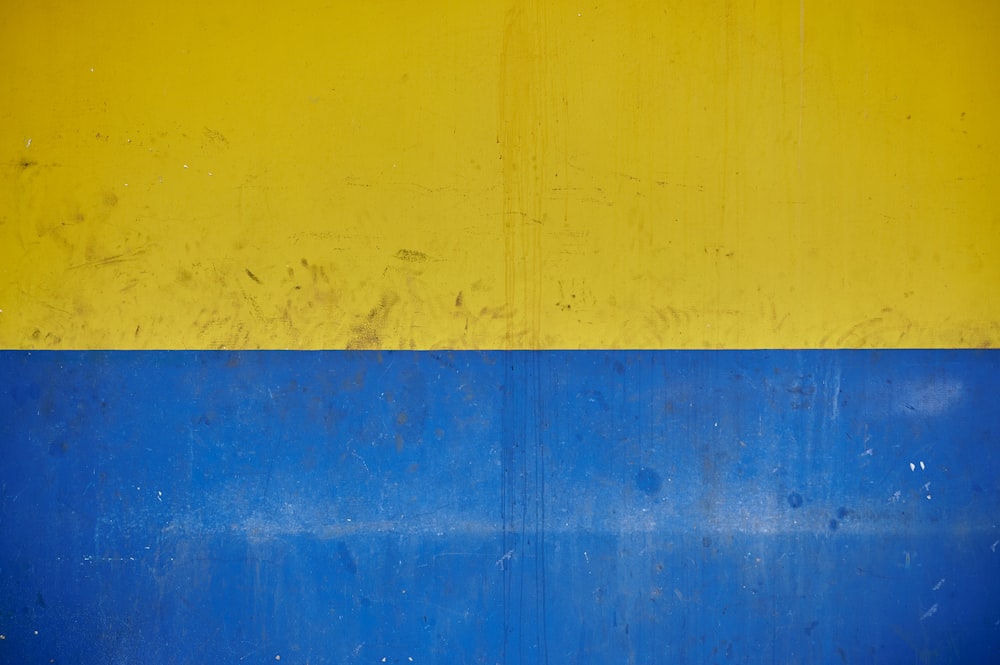 a close up of a blue door