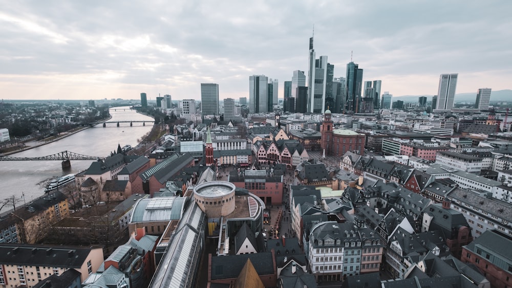 an aerial view of a city with a river running through it