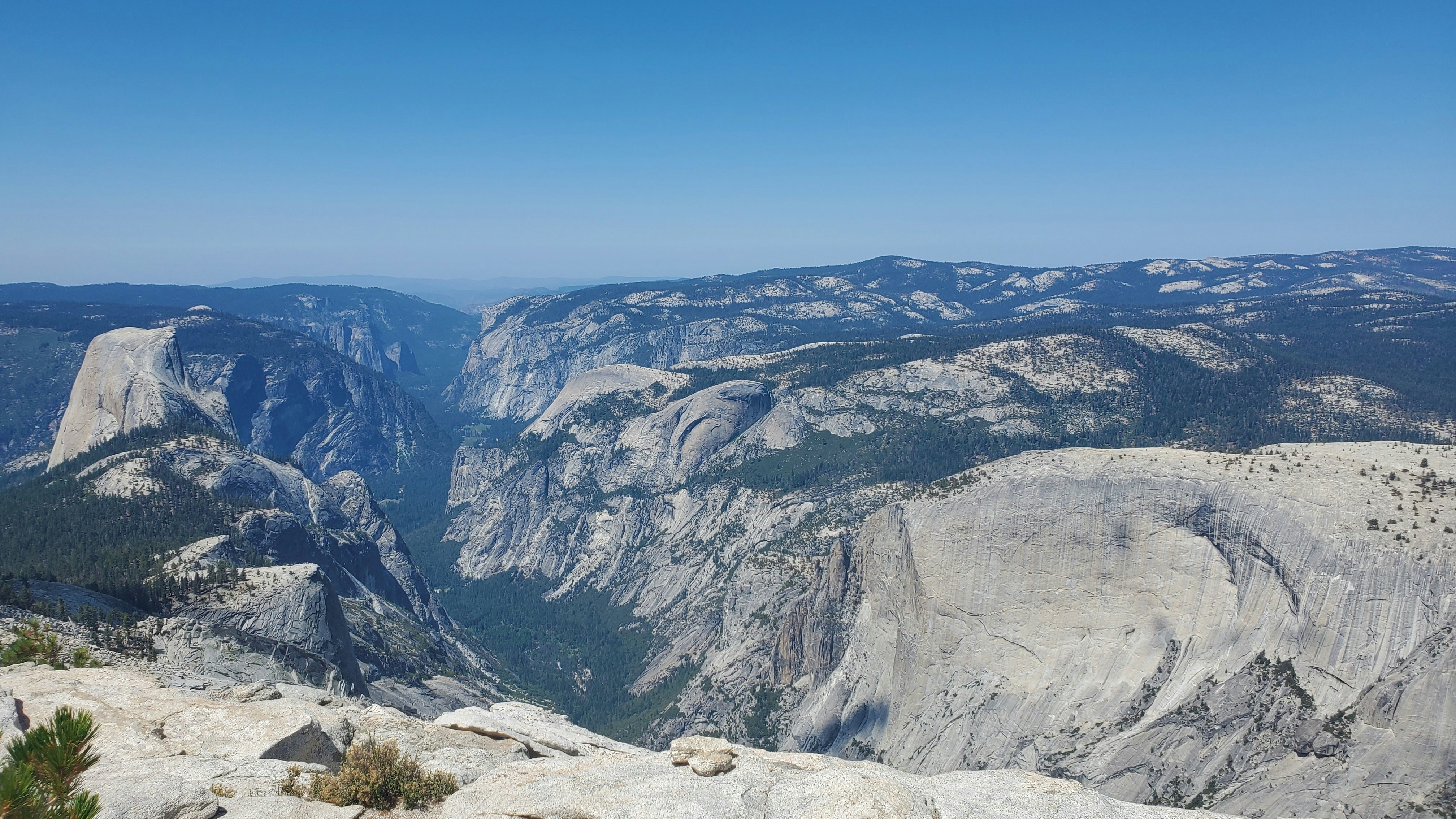 a view of the mountains from the top of a mountain