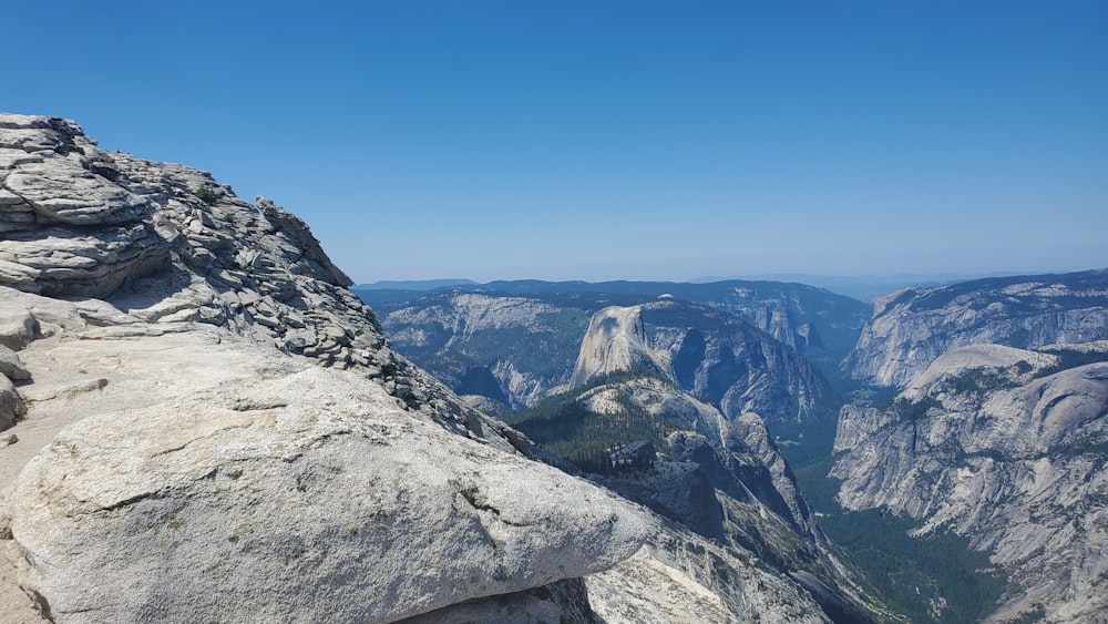 a view of the mountains from the top of a mountain