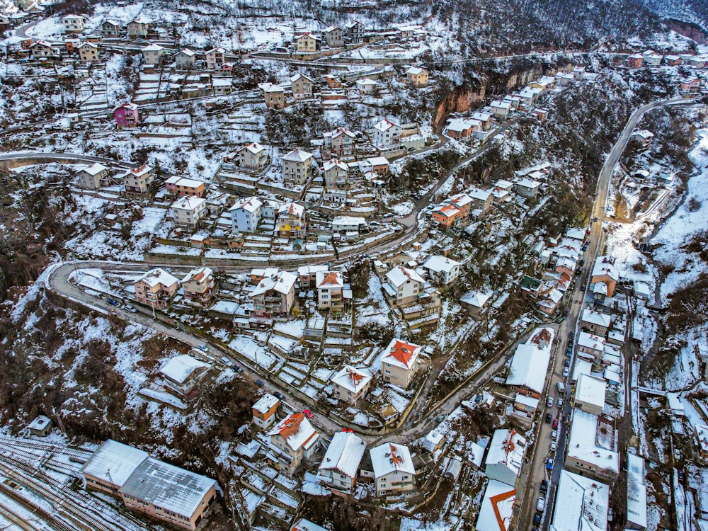 an aerial view of a snow covered town