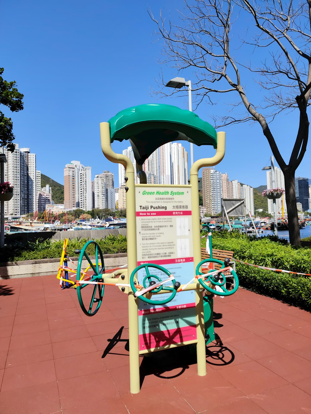 a small cart with a green top and wheels