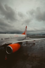 a large jetliner sitting on top of an airport tarmac
