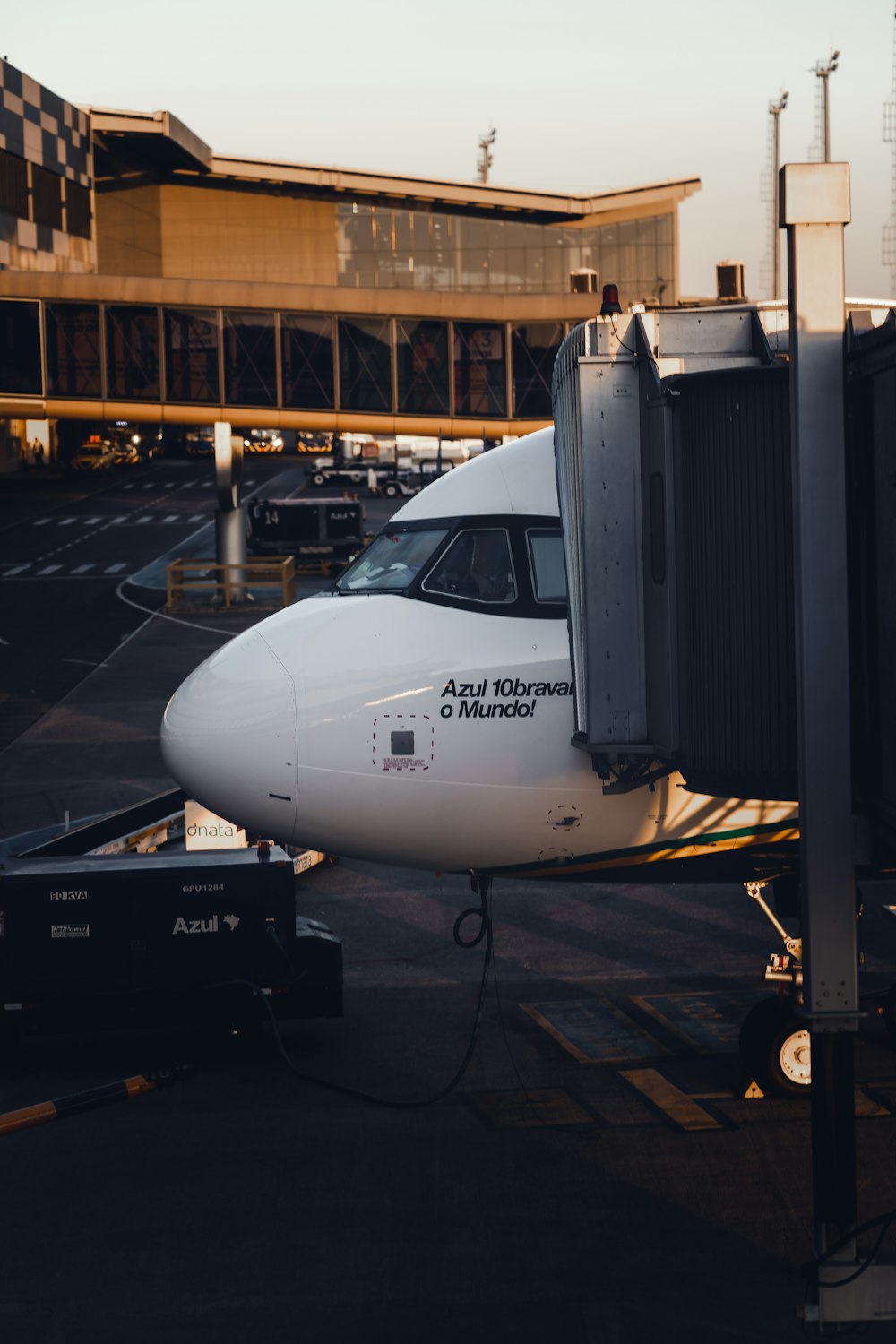 a large jetliner sitting on top of an airport tarmac