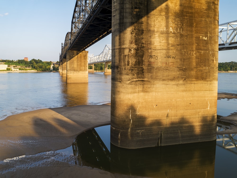 a view of a bridge over a body of water