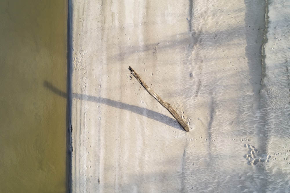 a piece of wood sticking out of the side of a building