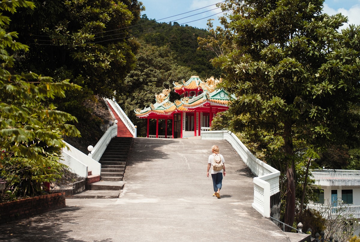 a woman walking up a set of stairs
