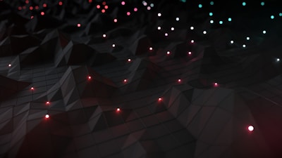 a black background with red, green, and blue lights